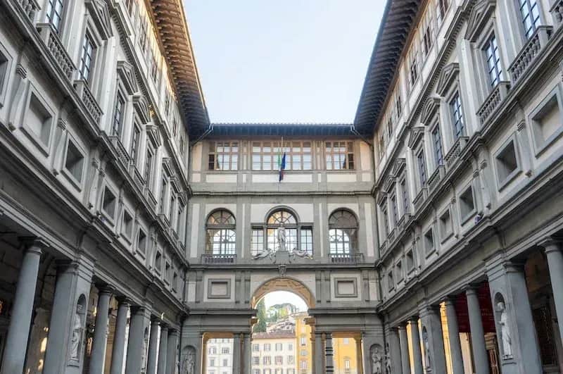 Exterior facade of famous Uffizi Galleries museum with Renaissance architecture in Florence Italy during Carpe Diem Tours art history cultural experience