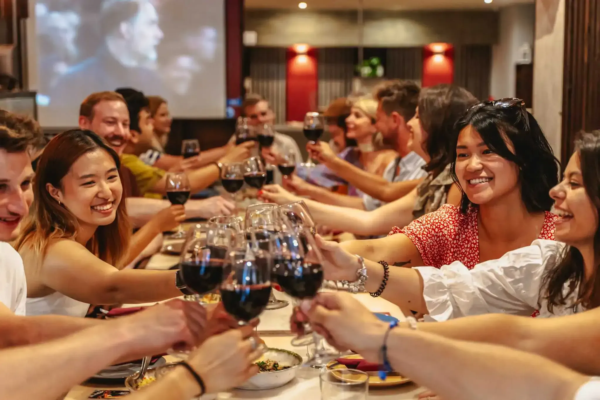 Group toasting with wine glasses during a Carpe Diem Lisbon food tour