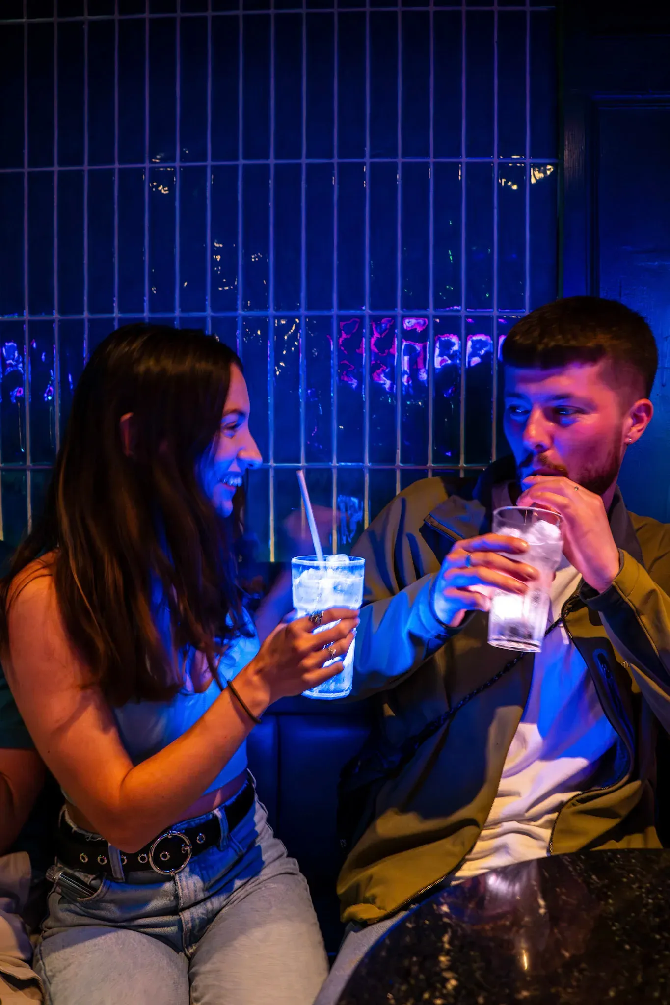 Couple is drinking cocktails