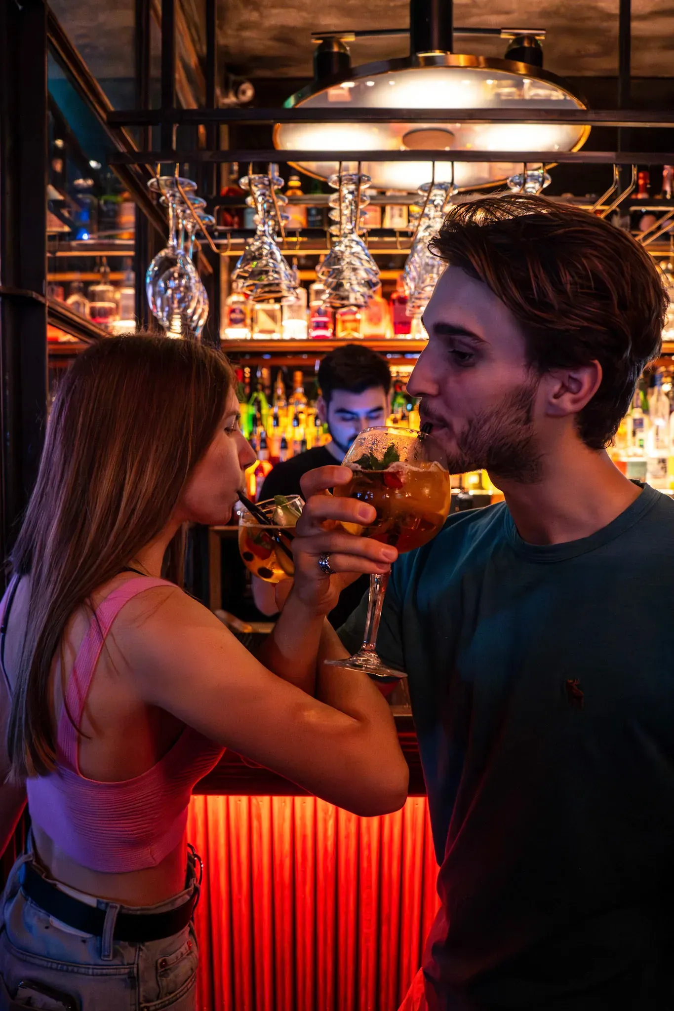 Couple is drinking cocktails