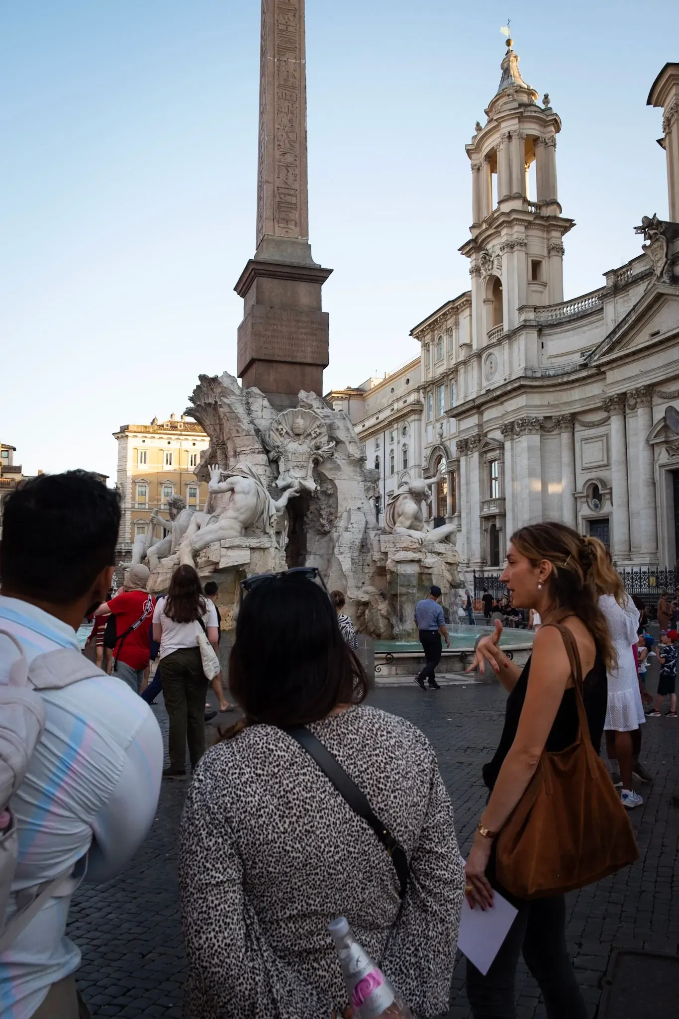 Tourists visiting iconic Trevi Fountain during Carpe Diem Tours Rome walking tour exploring famous landmarks and attractions