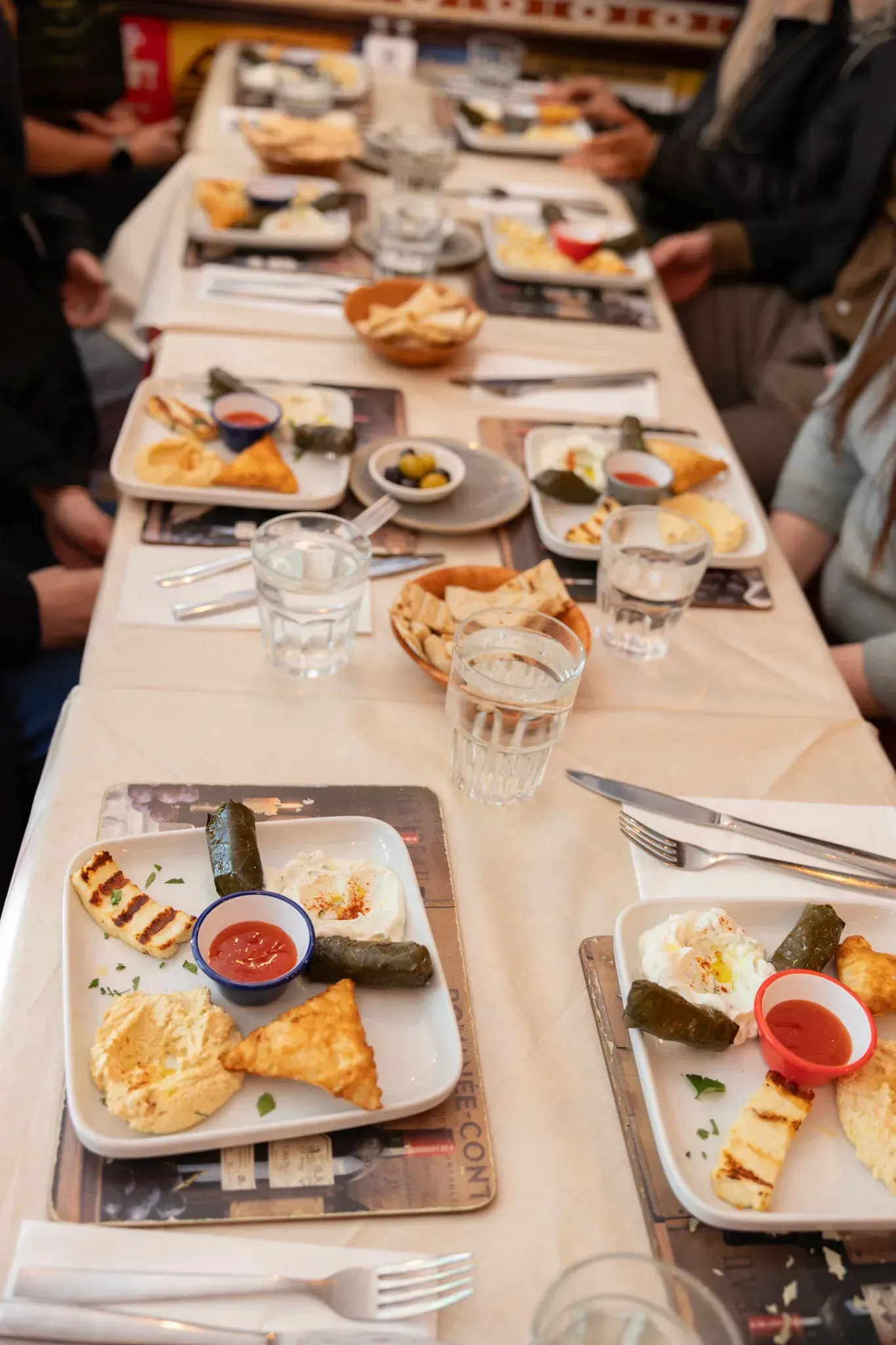Delicious bread and drinks served at restaurant table during Carpe Diem Tours London food tour culinary experience exploring authentic British cuisine and local dining culture