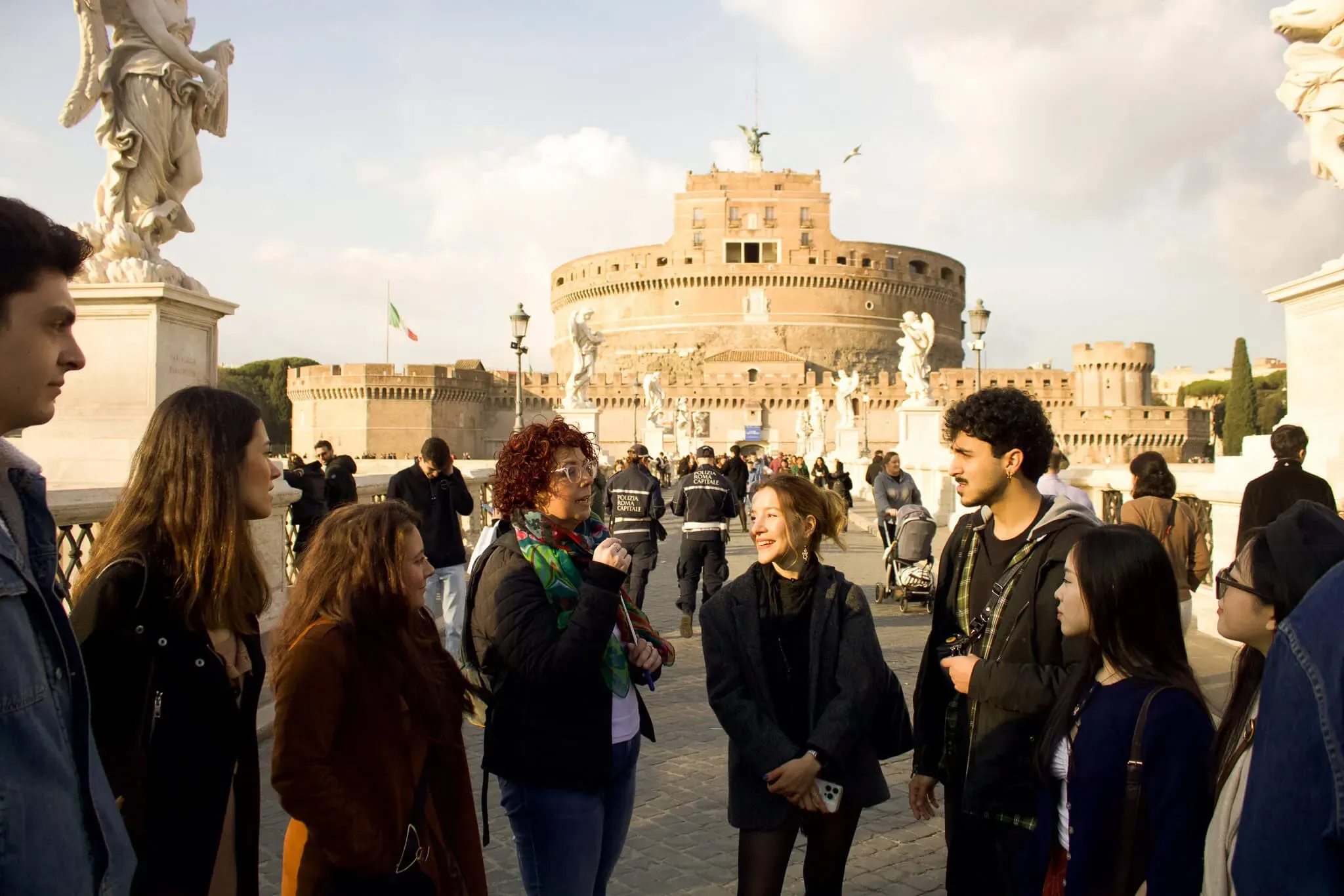 Tourists visiting historic Castel Sant'Angelo fortress and mausoleum during Carpe Diem Tours Rome sightseeing experience