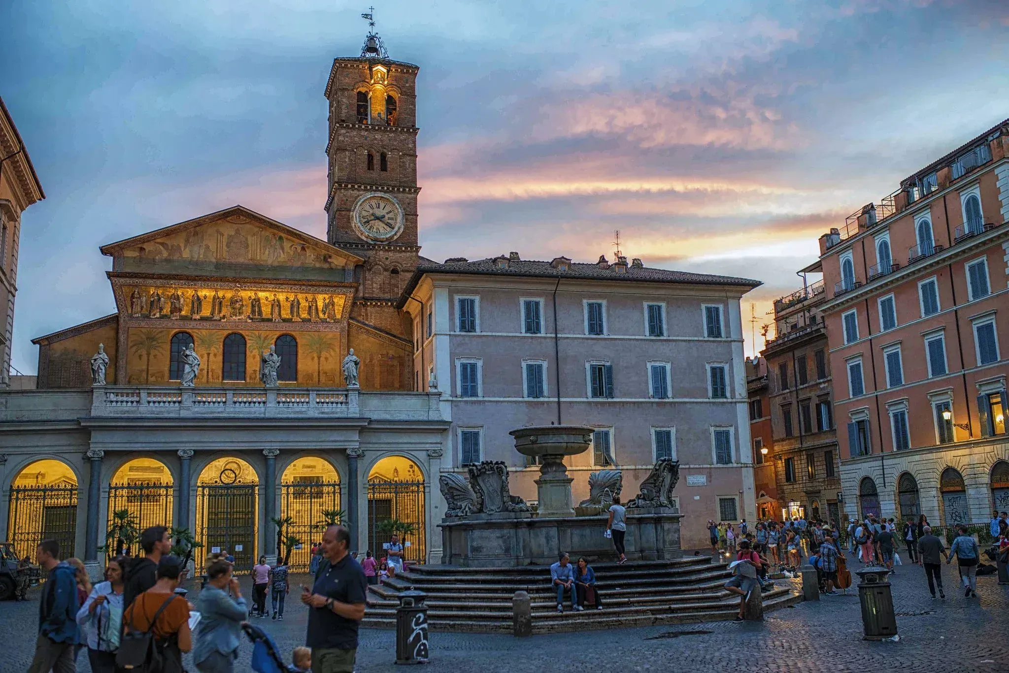 Historic Basilica Santa Maria in Trastevere church facade and piazza showcasing medieval Roman architecture during Carpe Diem Tours Rome religious heritage experience