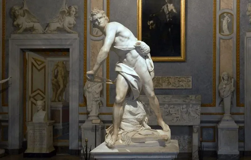 David sculpture marble statue masterpiece displayed in Borghese Gallery Rome Italy