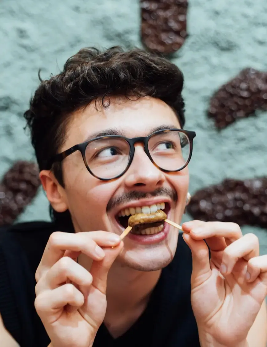 Boy is eating Madrid food