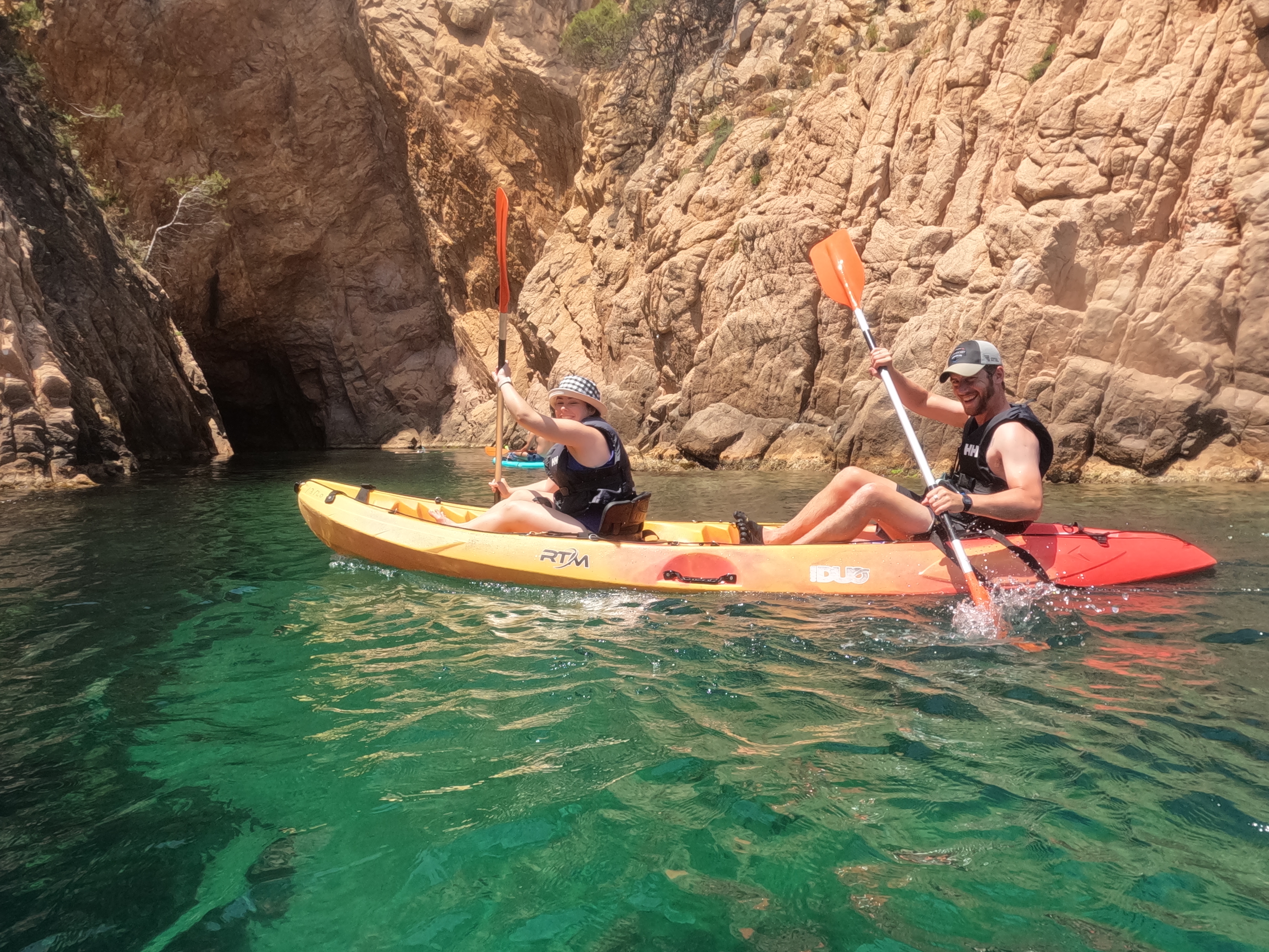 two people kayaking in costa brava on a barcelona day trip