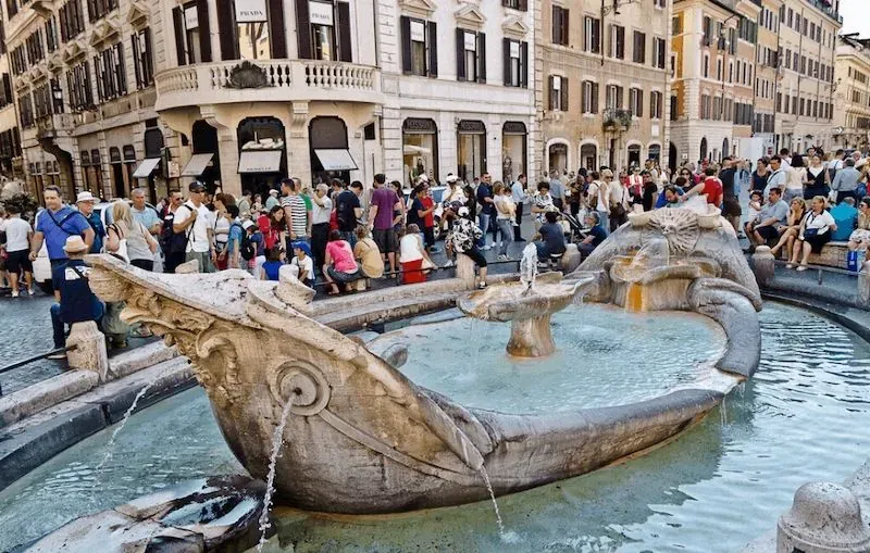 La Barcaccia Fountain (Fountain of the Old Boat) at the foot of the Spanish Steps in Rome