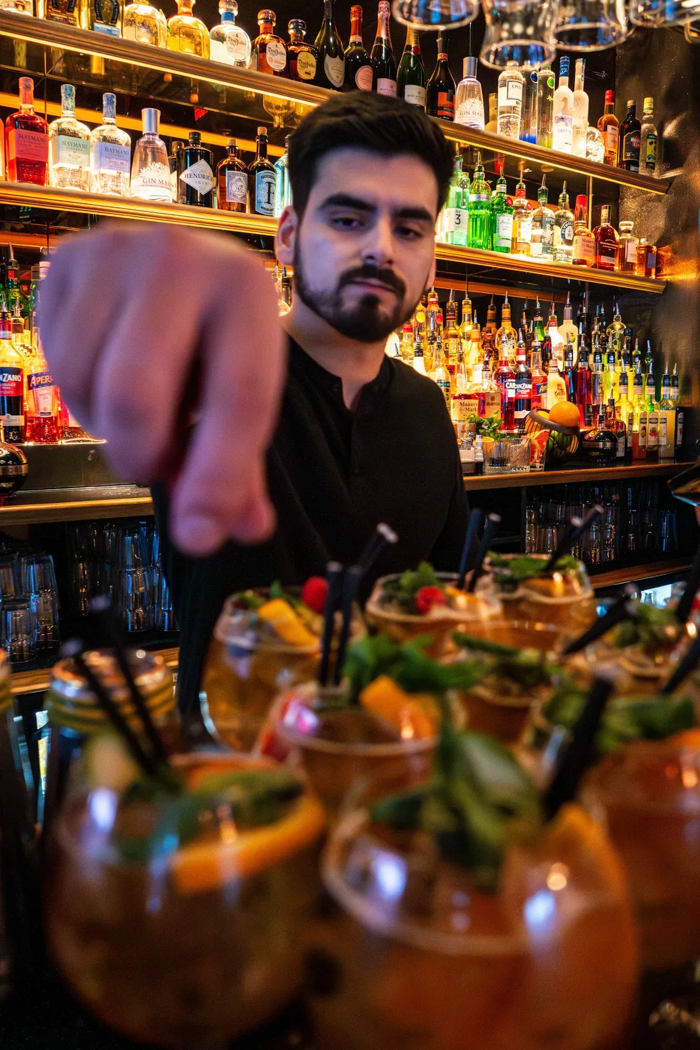 barmen is making cocktails