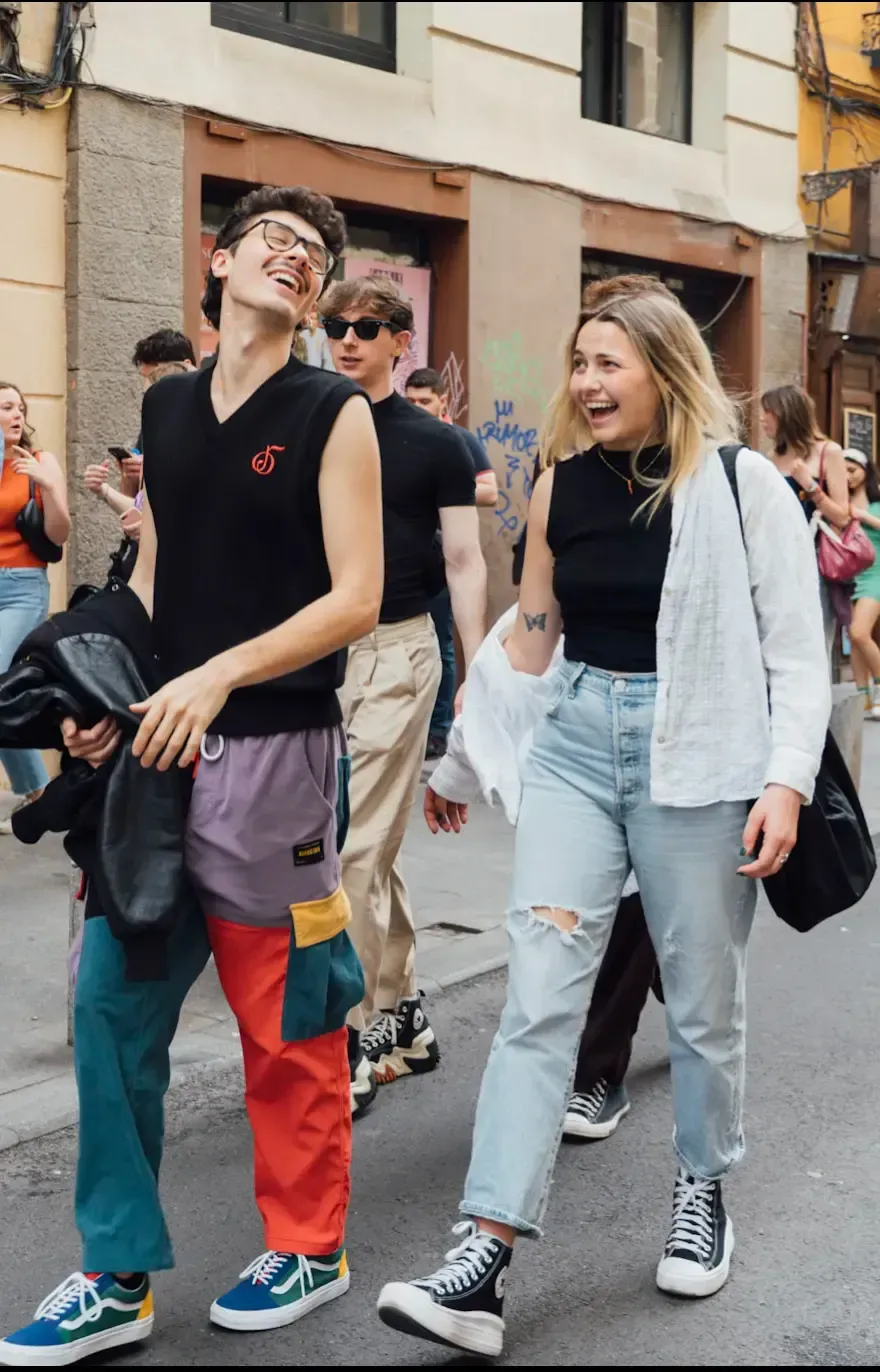Group of tourists enjoying guided Madrid walking tour exploring historic Spanish city center and cultural landmarks with Carpe Diem Tours professional guide