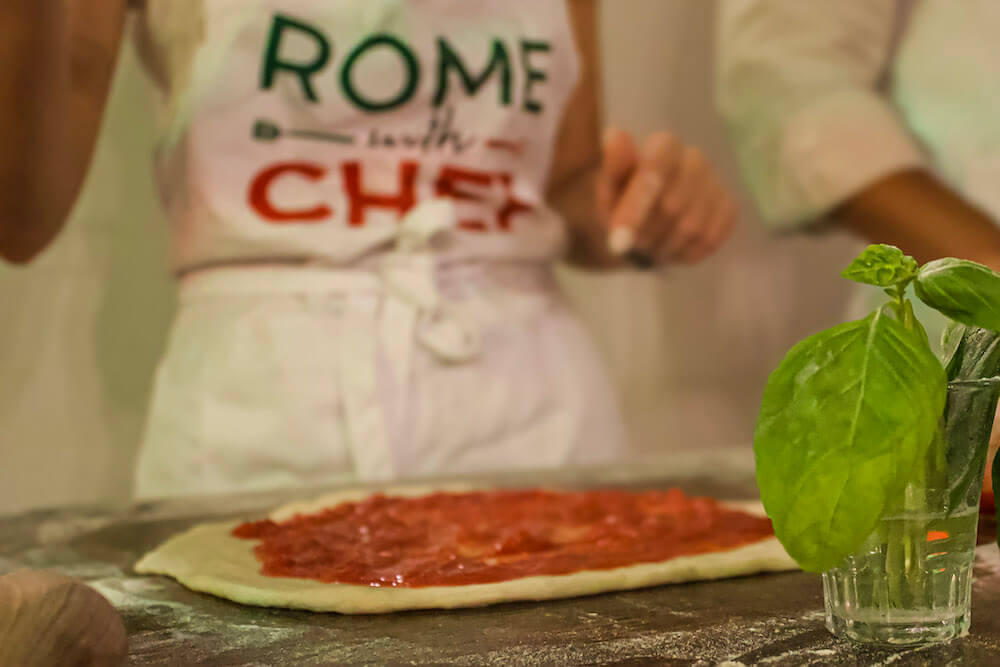 Making pizza on a Rome cooking class