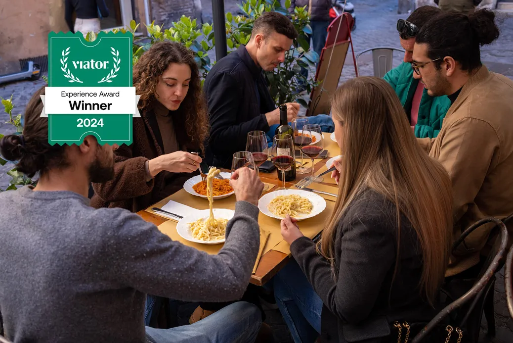 Customers are eating pasta on Rome Food Tour