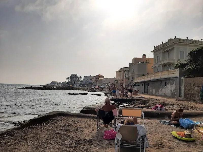Beachfront view of Santa Marinella, Italy, showing Spiaggia Libera and coastal buildings