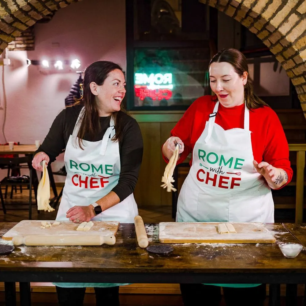 Spritz-and-Spaghetti-clients-playing-with-pasta-smiling