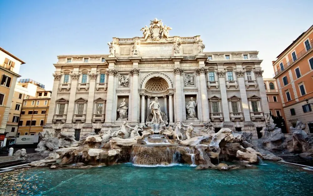 Iconic Trevi Fountain baroque architecture and sculptures in Rome Italy showcasing famous tourist landmark during Carpe Diem Tours Rome walking tour and cultural sightseeing experience