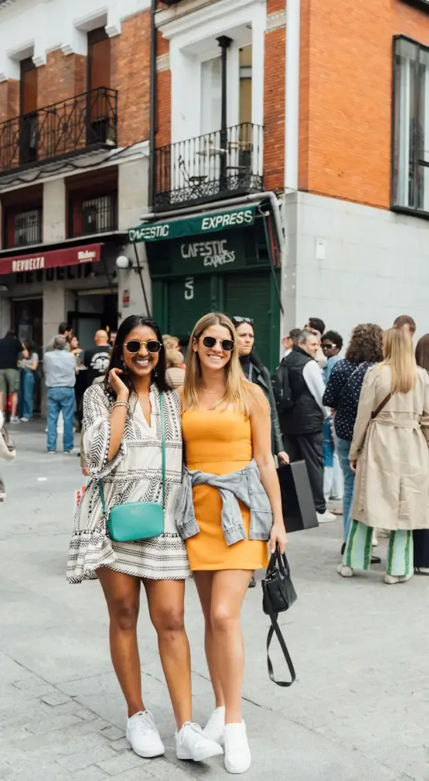 Girls are taking pictures in Madrid