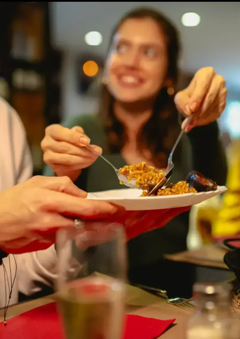Traditional paella rice dish on Barcelona food tour