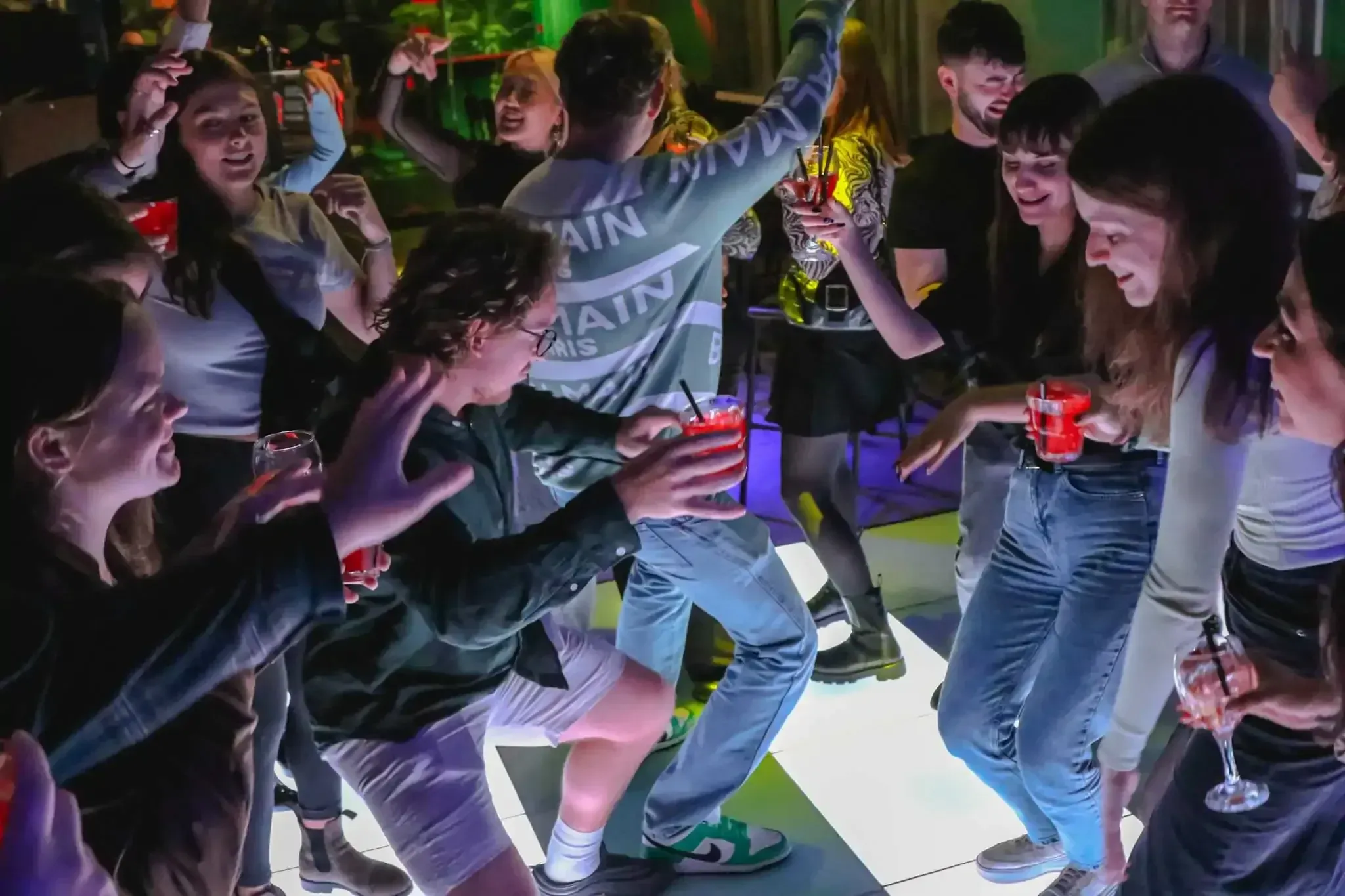 Dancers enjoying drinks and nightlife on Budapest tipsy tour