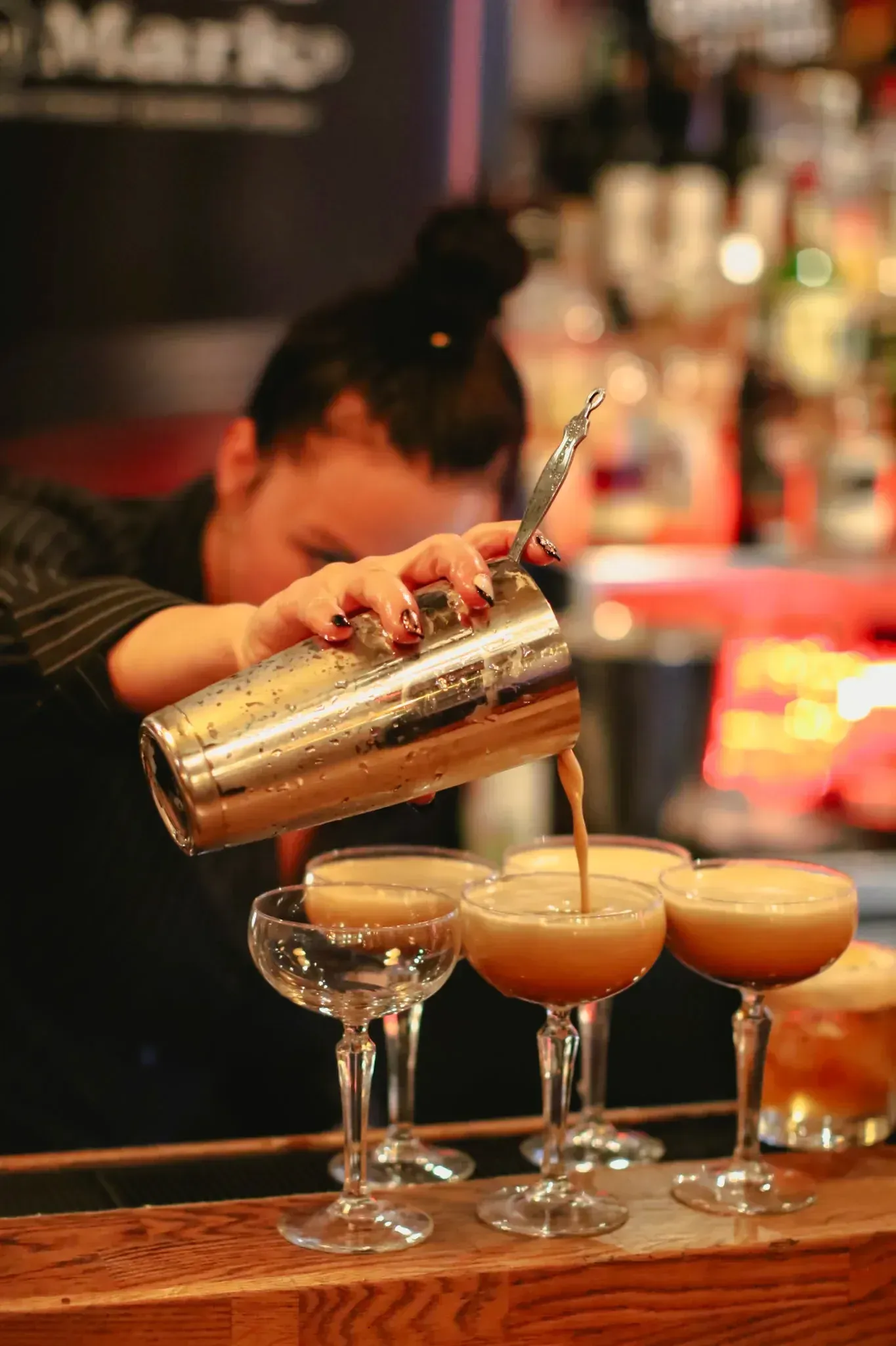 Group of friends cheering with drinks on Budapest tipsy tour