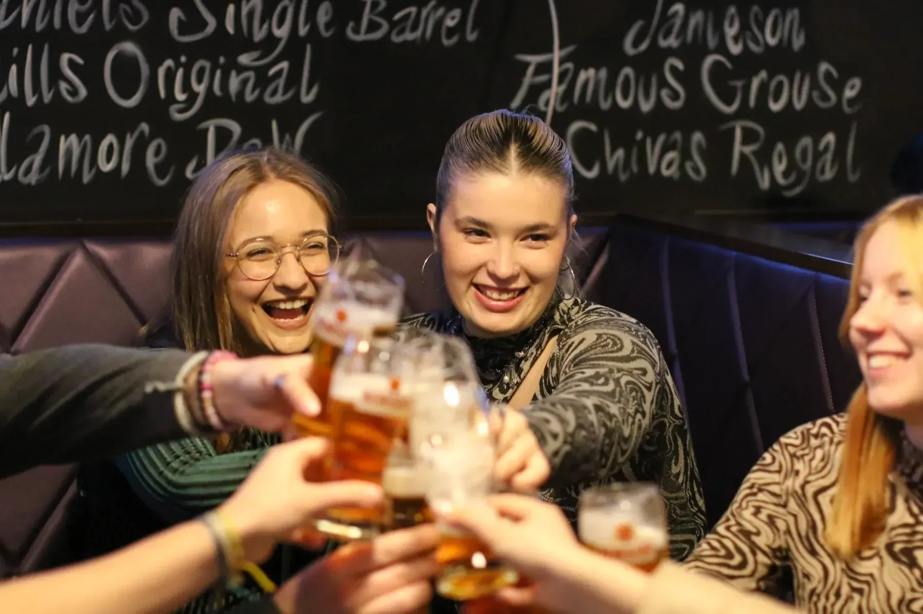 Group of travelers visiting local Budapest bar on Private Tipsy Tour experience