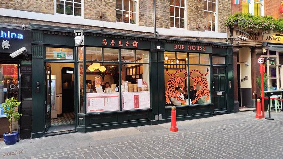 Authentic Chinese Bun House restaurant storefront in London featuring traditional signage and delicious food displays showcasing Asian cuisine during Carpe Diem Tours London food tour and cultural dining experience