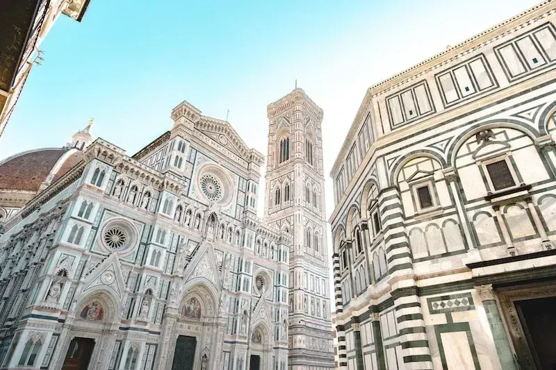 Florence Cathedral of Santa Maria del Fiore Duomo with iconic marble facade and Brunelleschi dome in Renaissance style