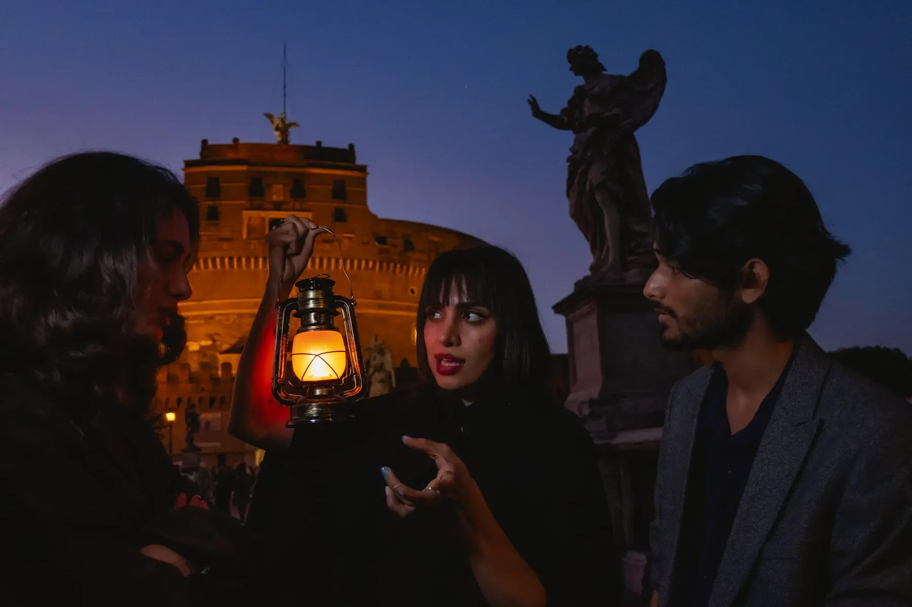Audience listening to ghost stories and legends during Rome ghost tour