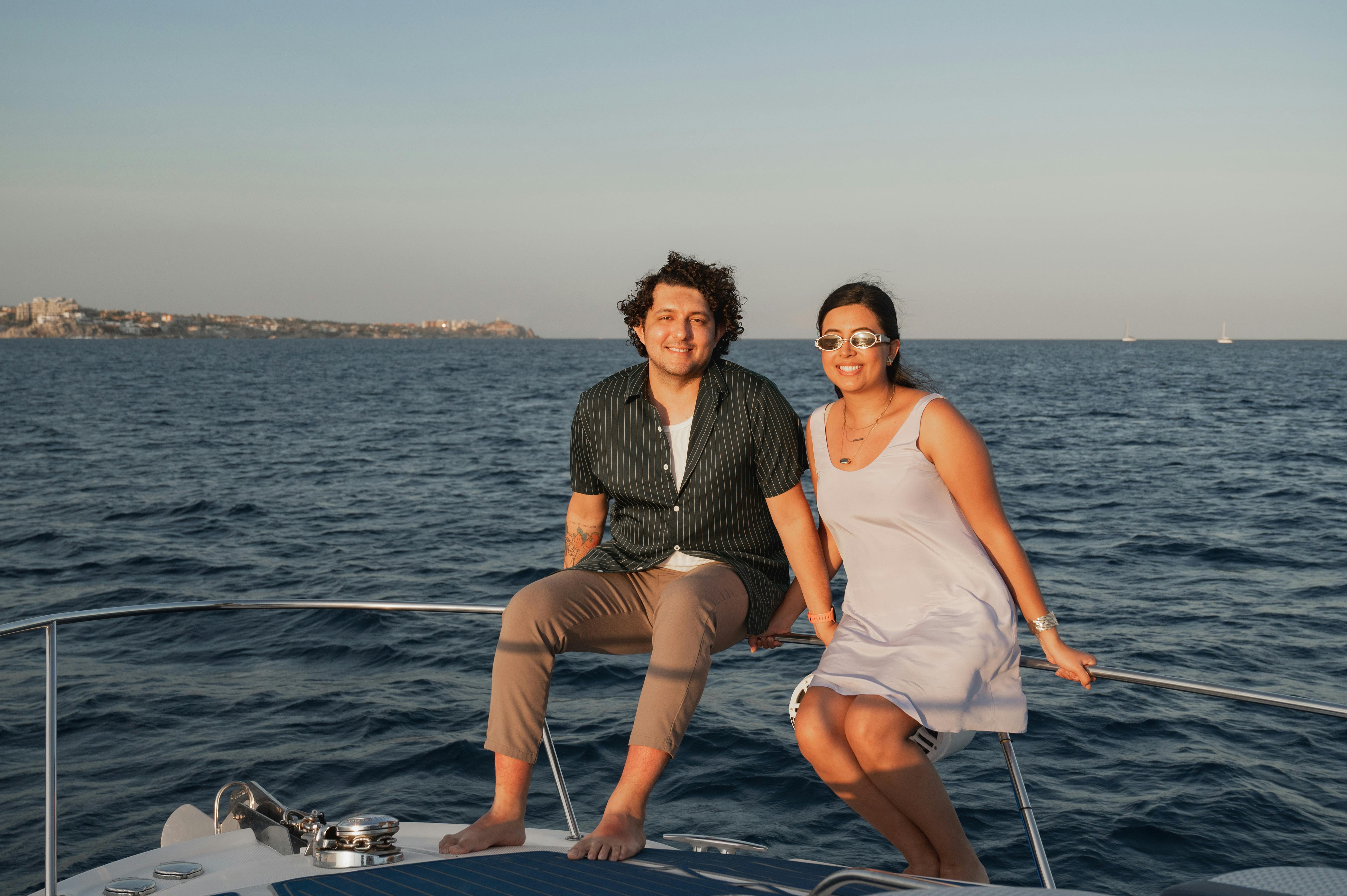A couple on a sunset cruise in Barcelona