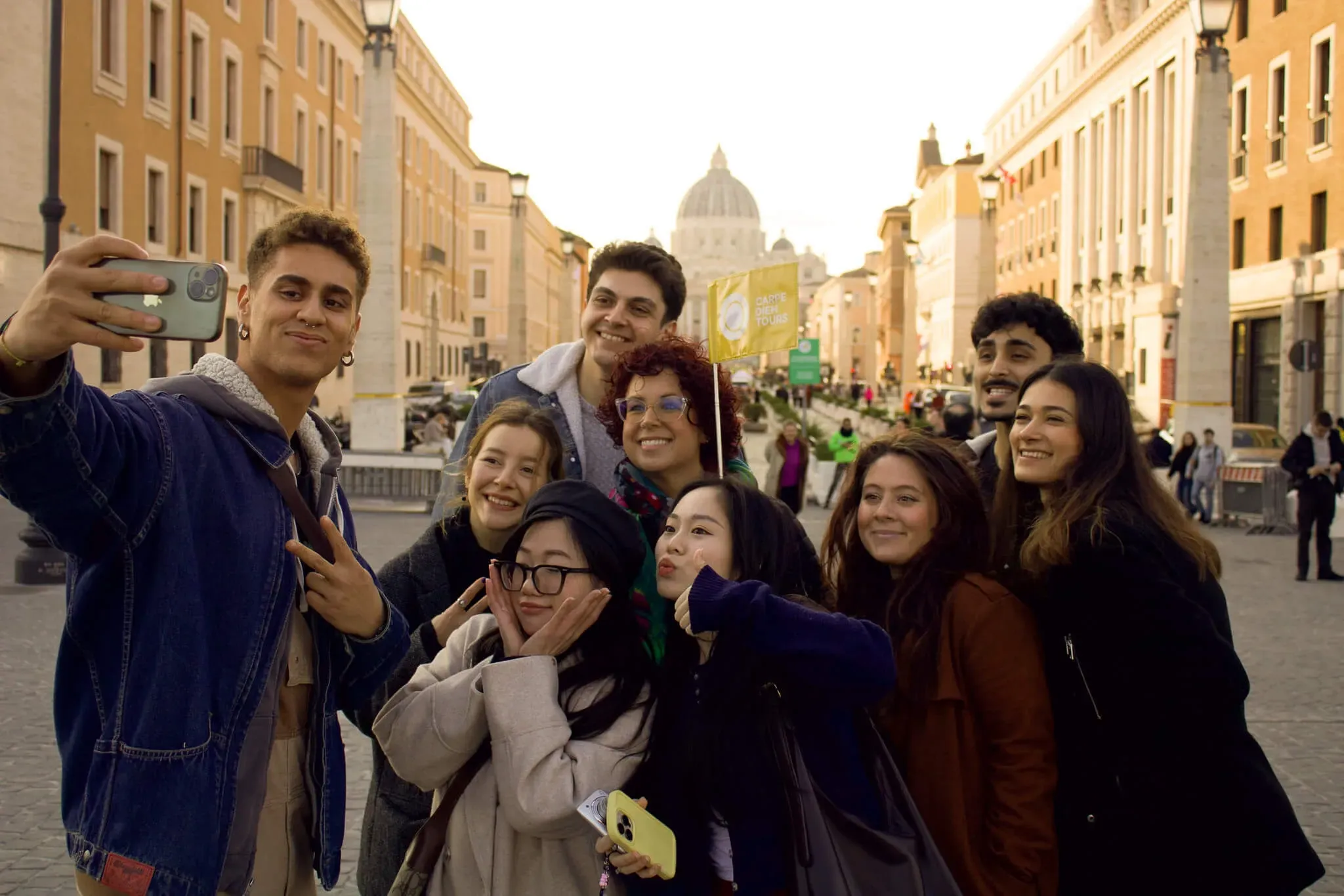 Happy group of tourists taking selfie photo during Carpe Diem Tours Rome walking tour experience