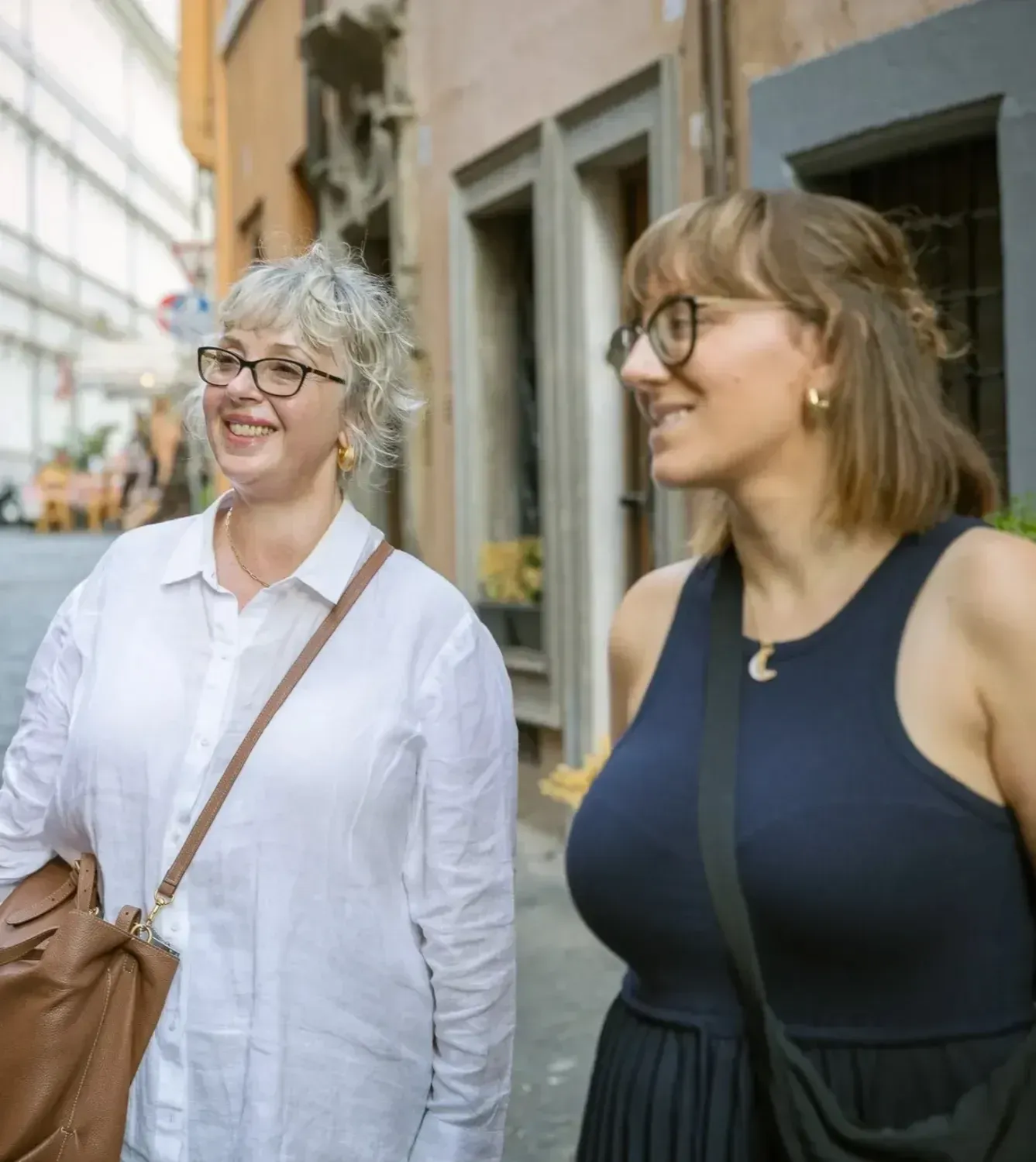 Travelers walking through historic Rome streets on Colosseum tour