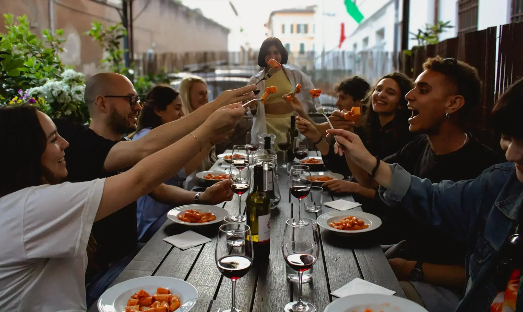 Group of participants dining together during Spanish Rome Food Tour culinary experience
