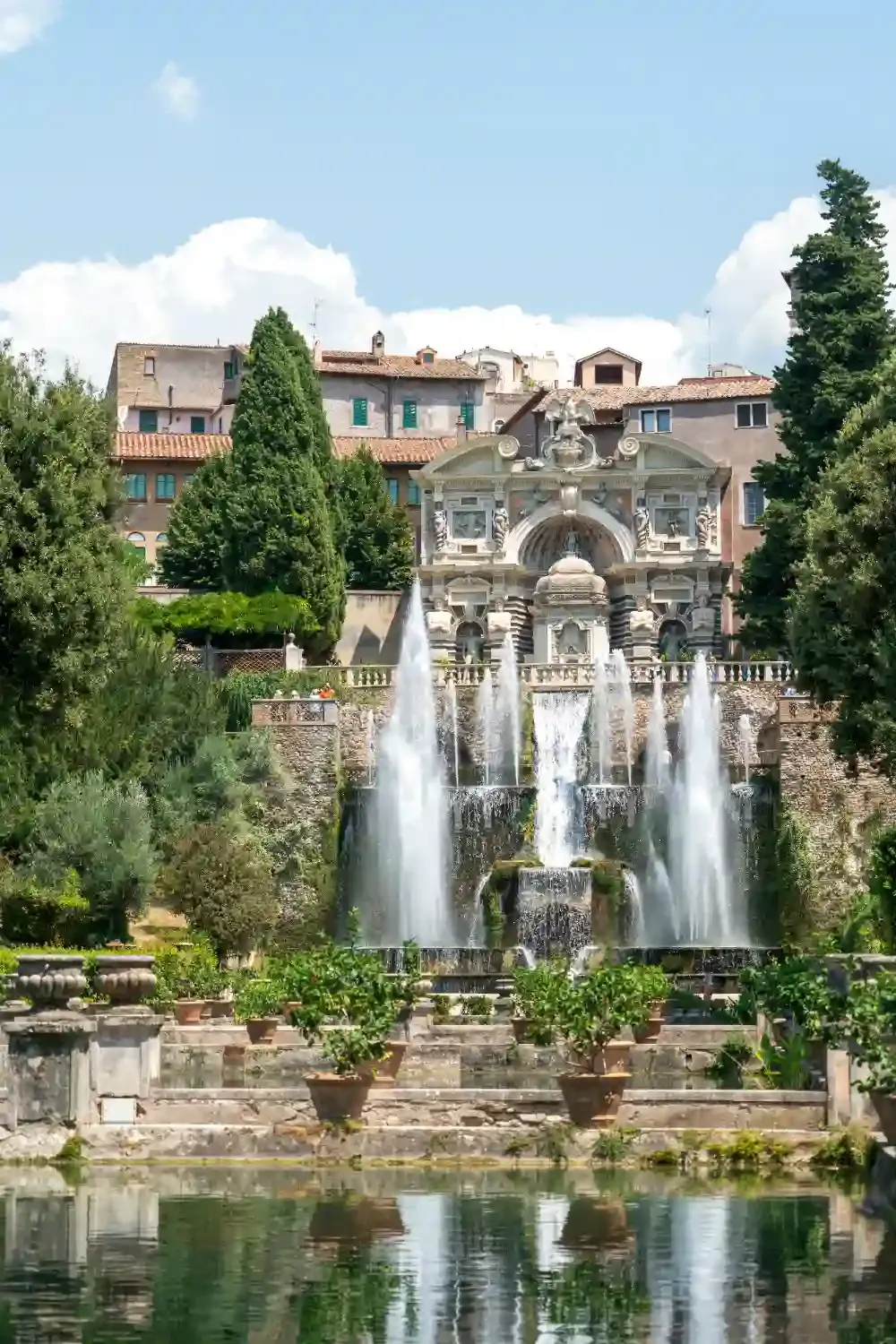 Villa d'Este Renaissance fountain with ornate architecture water features and historic estate buildings in background