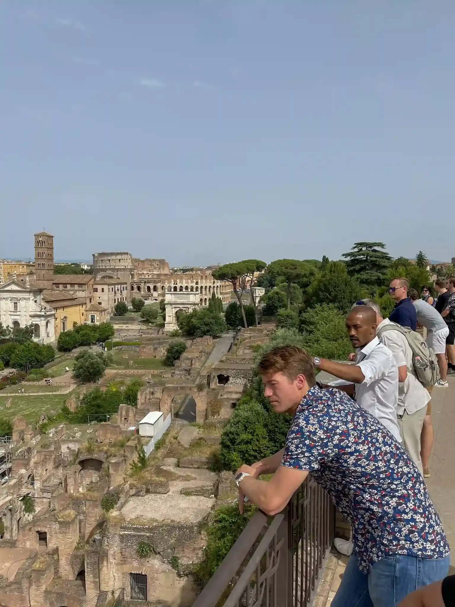 Group of travelers experiencing exclusive underground chamber access at the Colosseum