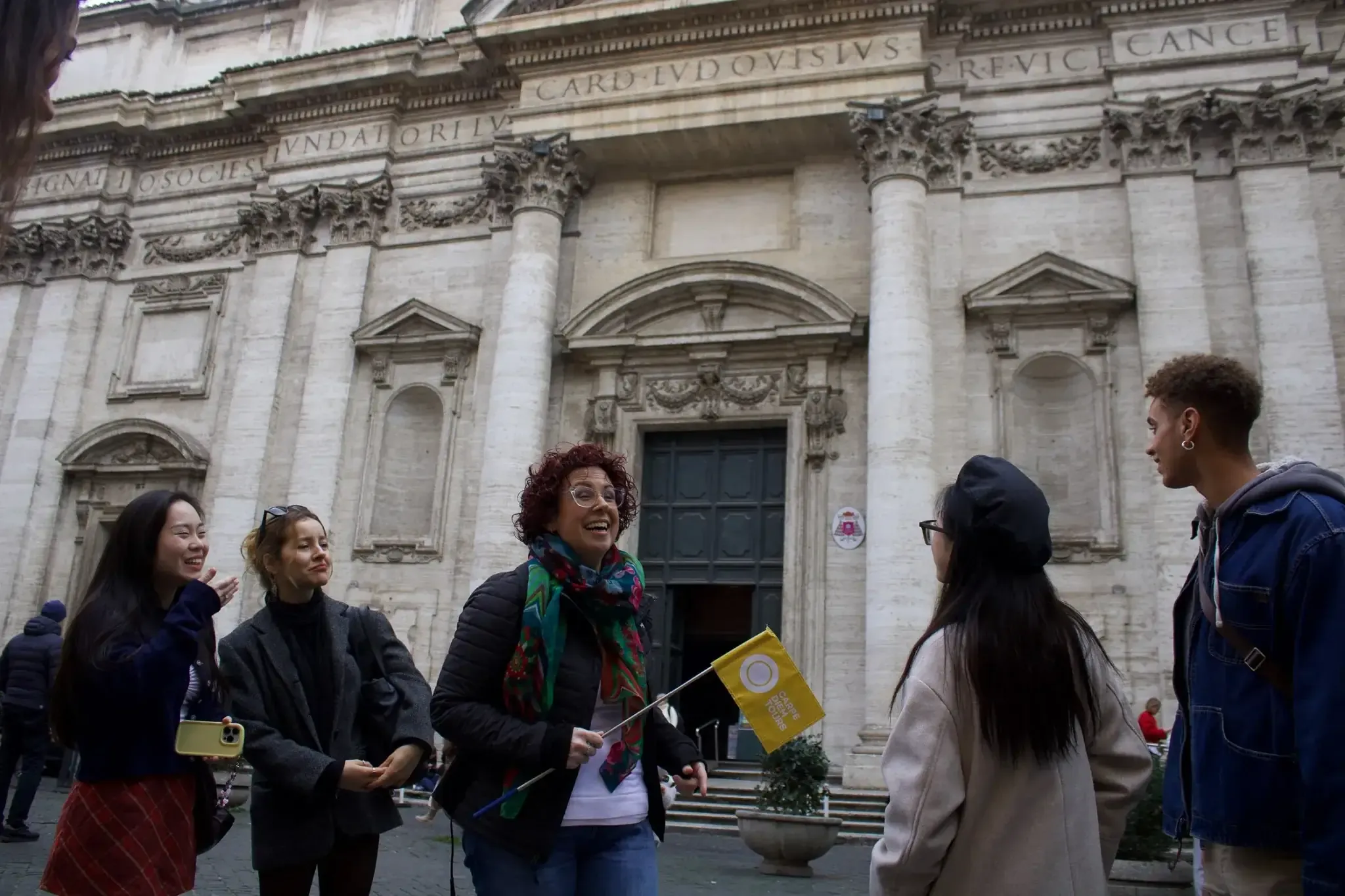 Walking tour group admiring Bernini fountains in Piazza Navona
